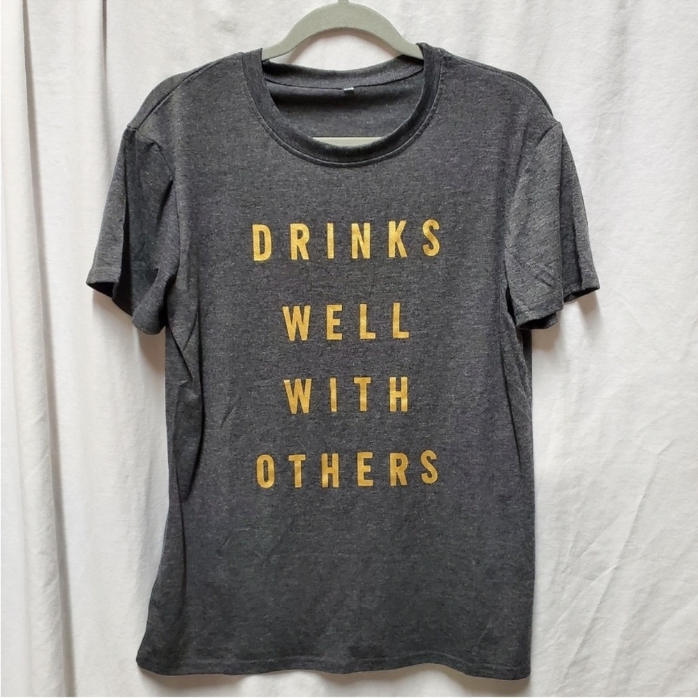 “Drinks well with others” unisex T-shirt M
